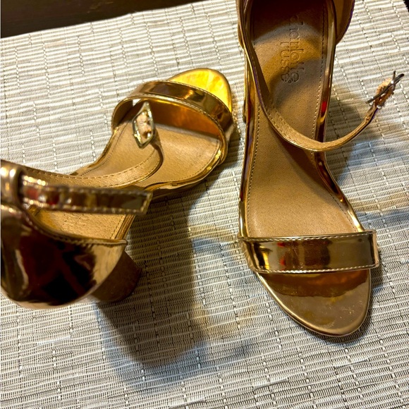 Charlotte Russe Shoes - Super comfy and sexy size 7 gold heels